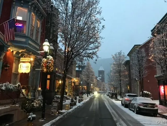 a view of a city street from a building