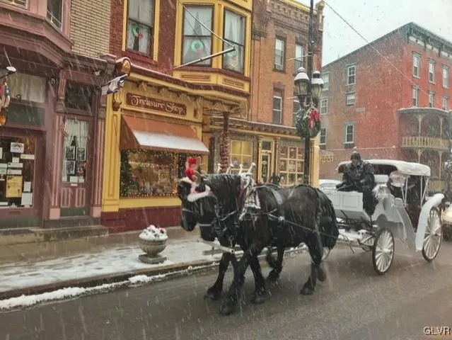 a view of a street with sitting area