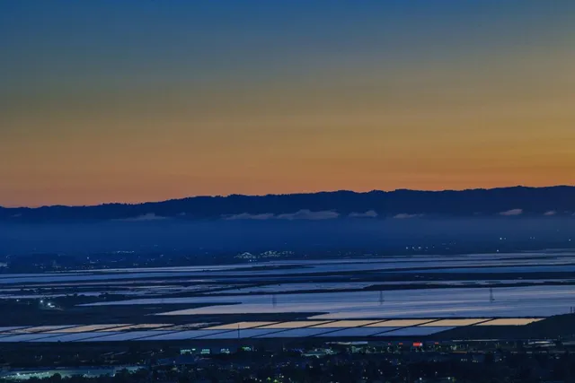 a view of city and mountain