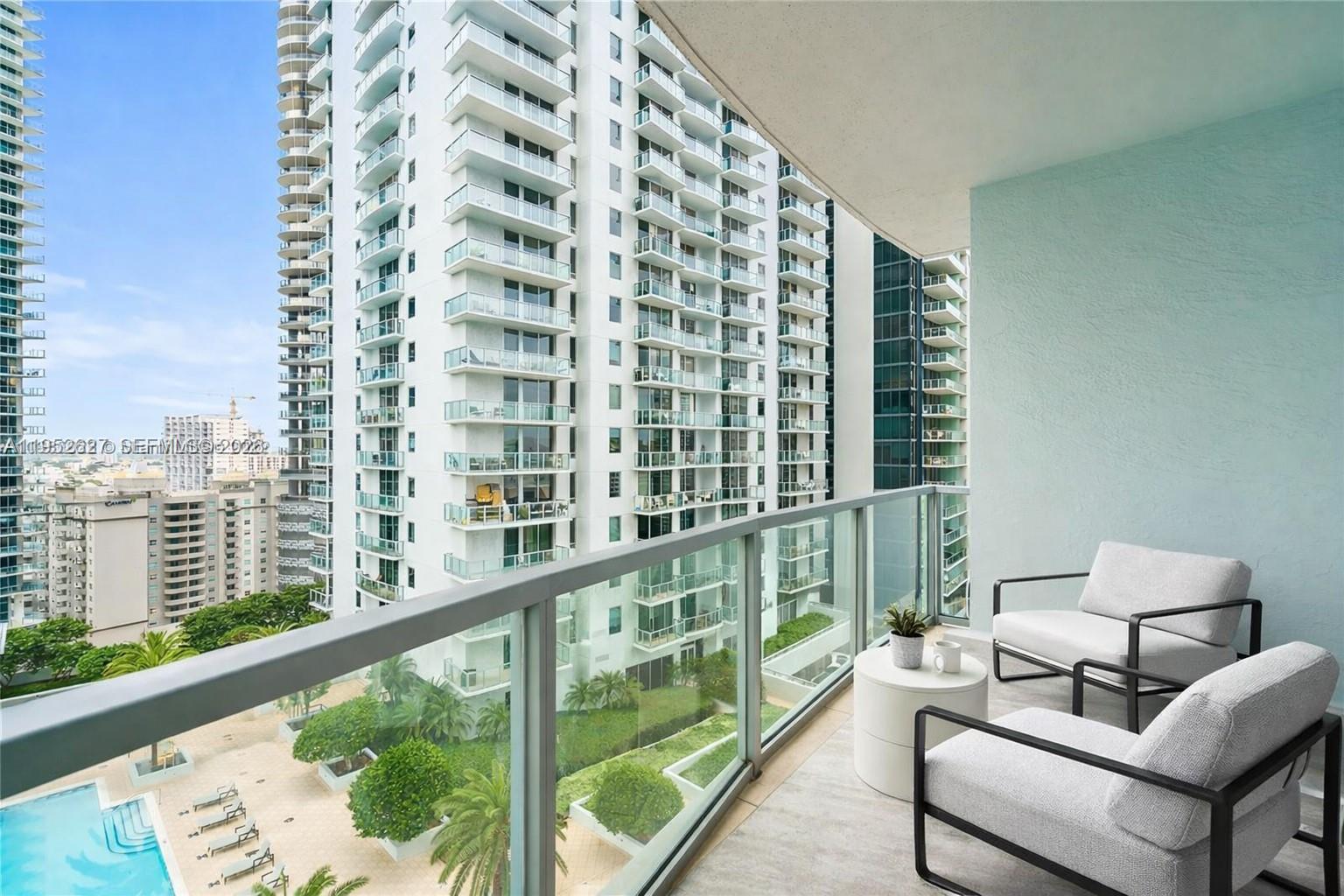 1060 Brickell Avenue, Unit 2013 Miami, FL 33131 - Photo 3 of 9 a balcony view with a couch