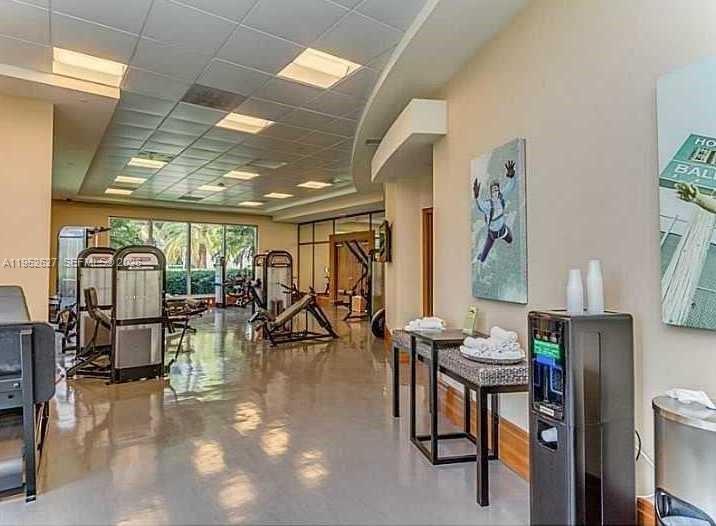 1060 Brickell Avenue, Unit 2013 Miami, FL 33131 - Photo 8 of 9 a view of a dining room with furniture
