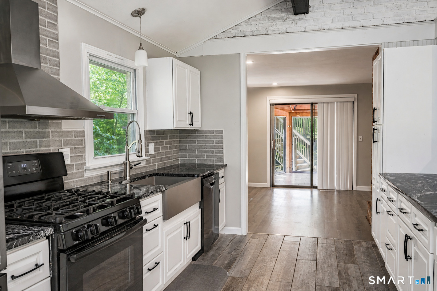 98 Fairy Dell Road Clinton, CT 06413 - Photo 6 of 25 Whether you're preparing a quiet breakfast or hosting a crowd, this beautifully remodeled kitchen was designed to bring people together.