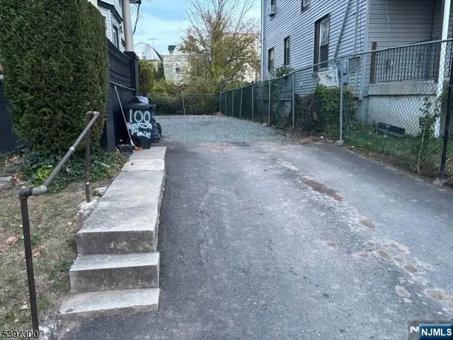 a view of path and green space