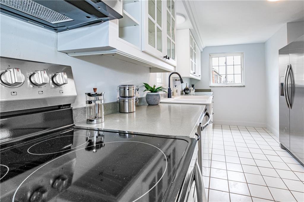 4 Robinhood Road Pittsburgh, PA 15220 - Photo 13 of 25 a kitchen with a sink appliances and cabinets