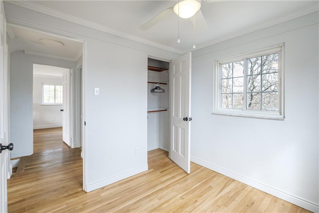 4 Robinhood Road Pittsburgh, PA 15220 - Photo 16 of 25 wooden floor in an empty room with a window