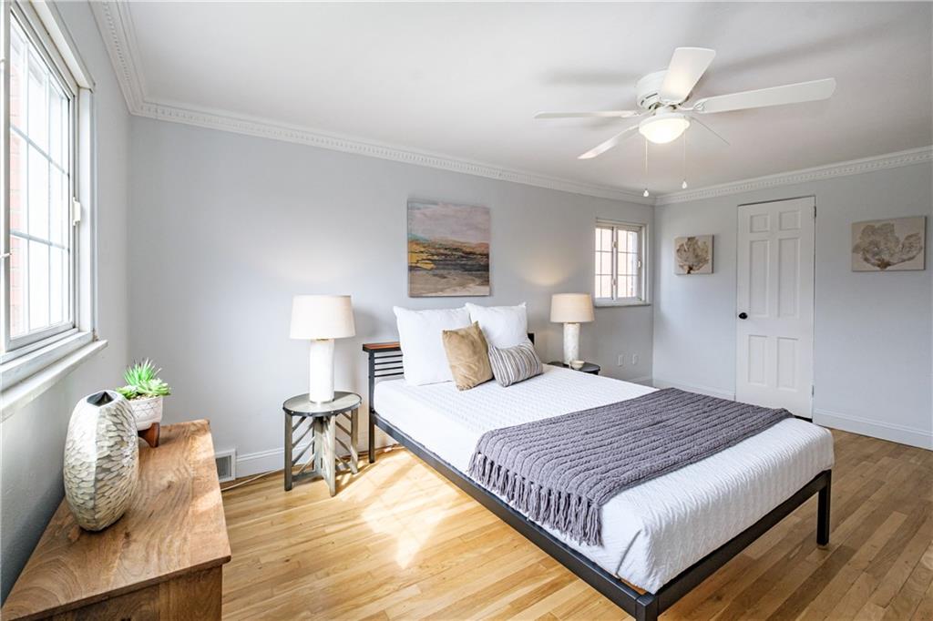 4 Robinhood Road Pittsburgh, PA 15220 - Photo 18 of 25 a bedroom with a bed and window