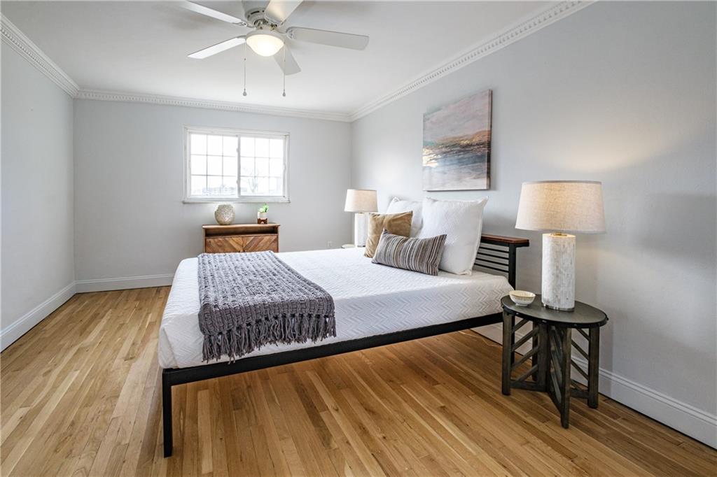 4 Robinhood Road Pittsburgh, PA 15220 - Photo 19 of 25 a bedroom with a bed and wooden floor