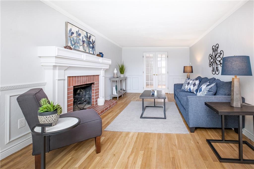 4 Robinhood Road Pittsburgh, PA 15220 - Photo 3 of 25 a living room with furniture and a fireplace