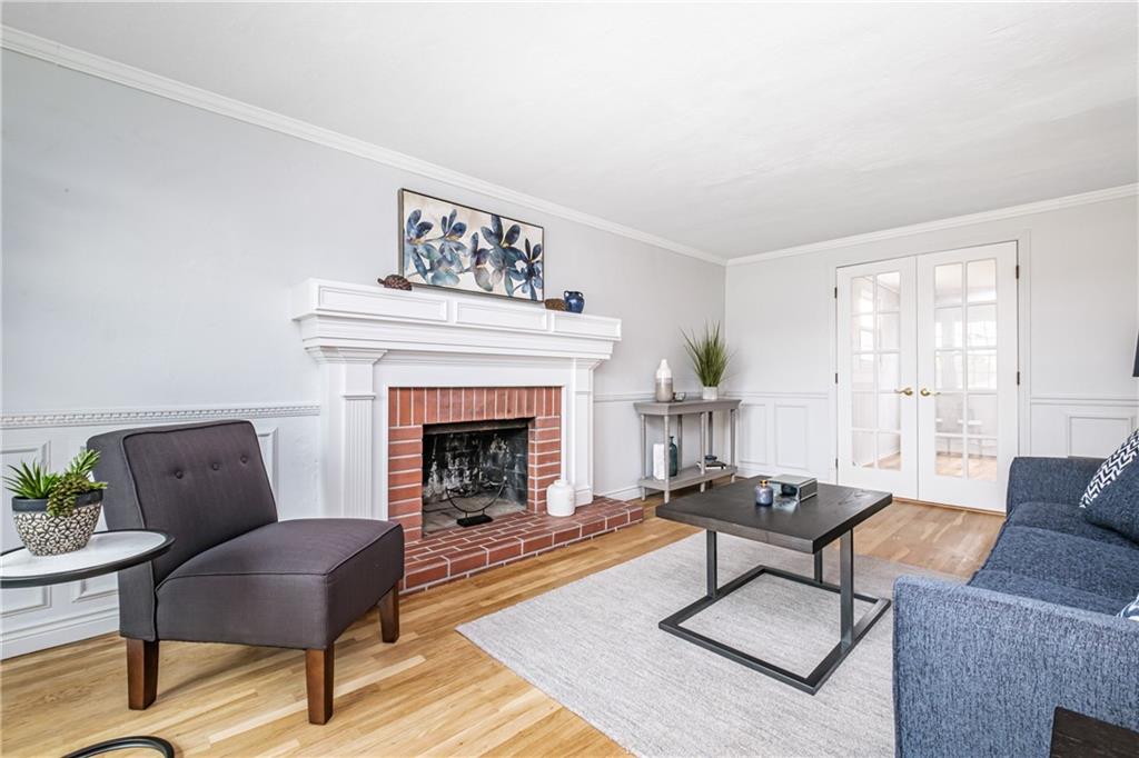 4 Robinhood Road Pittsburgh, PA 15220 - Photo 4 of 25 a living room with furniture and a fireplace