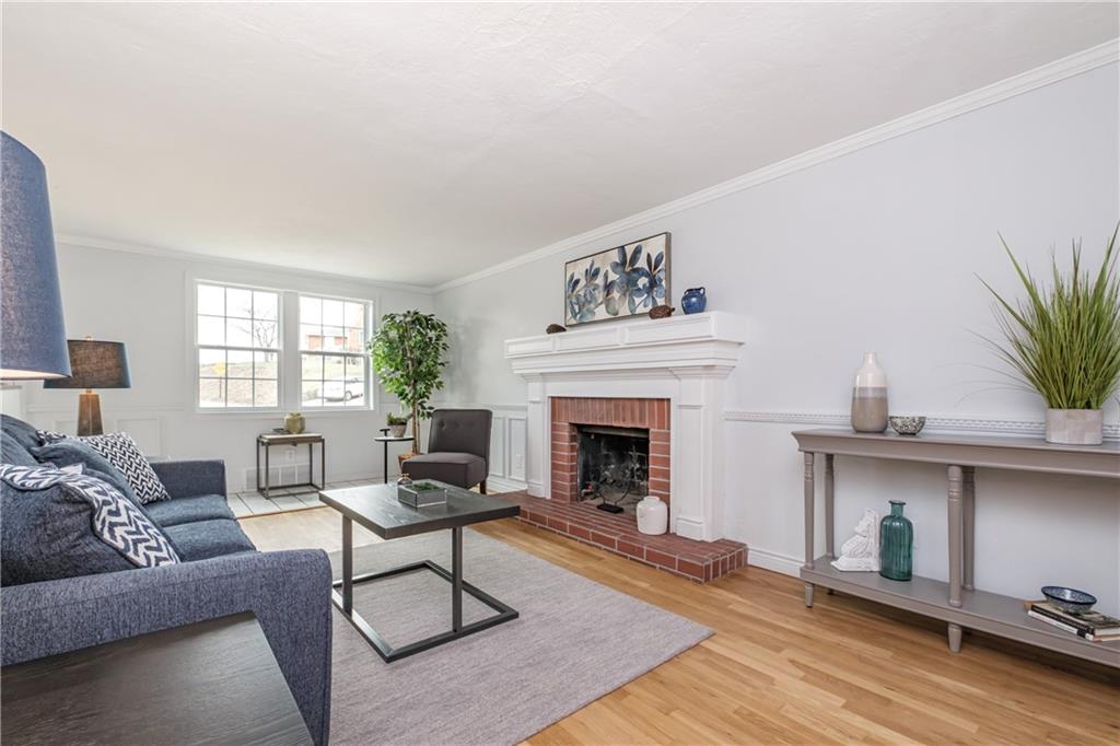 4 Robinhood Road Pittsburgh, PA 15220 - Photo 5 of 25 a living room with furniture and a fireplace