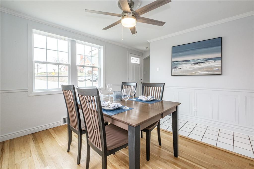 4 Robinhood Road Pittsburgh, PA 15220 - Photo 9 of 25 a view of a dining room with furniture window and wooden floor