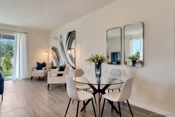 a kitchen with appliances a sink and cabinets