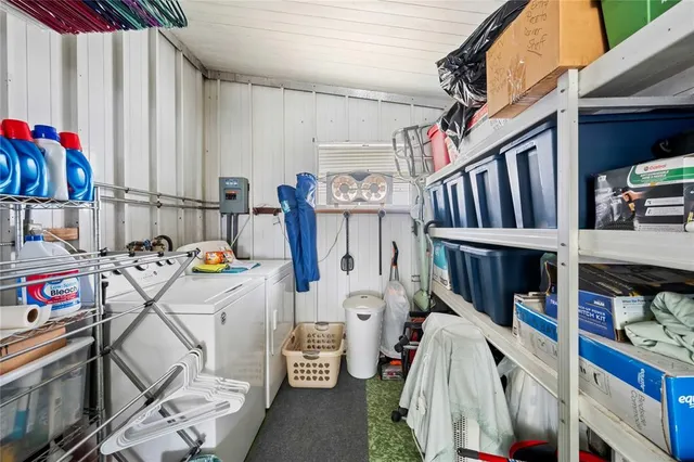 a view of a swimming pool with an outdoor seating