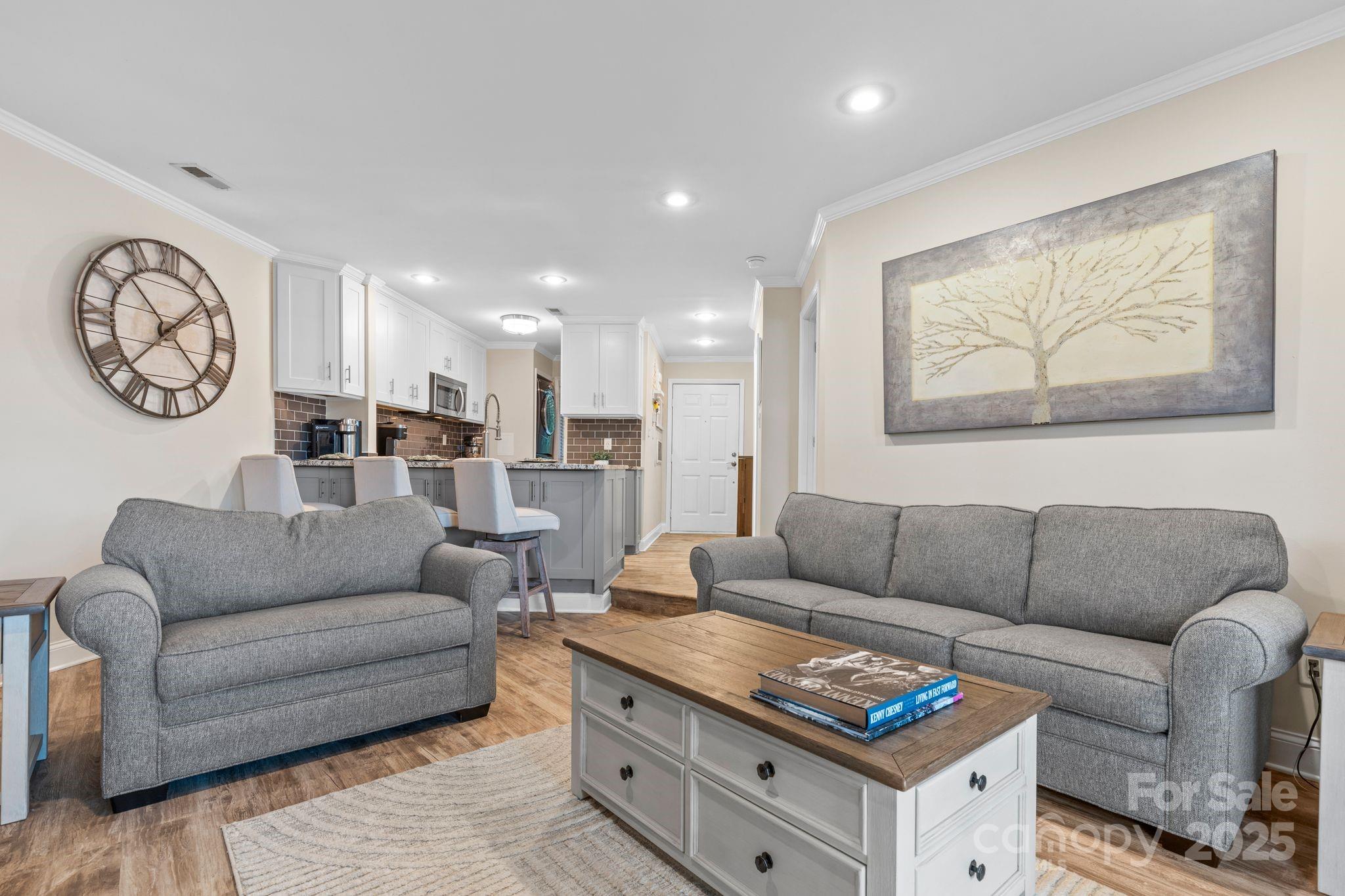 2121 Regatta Lane, Unit 209 Denver, NC 28037 - Photo 13 of 40 a living room with furniture and a couch