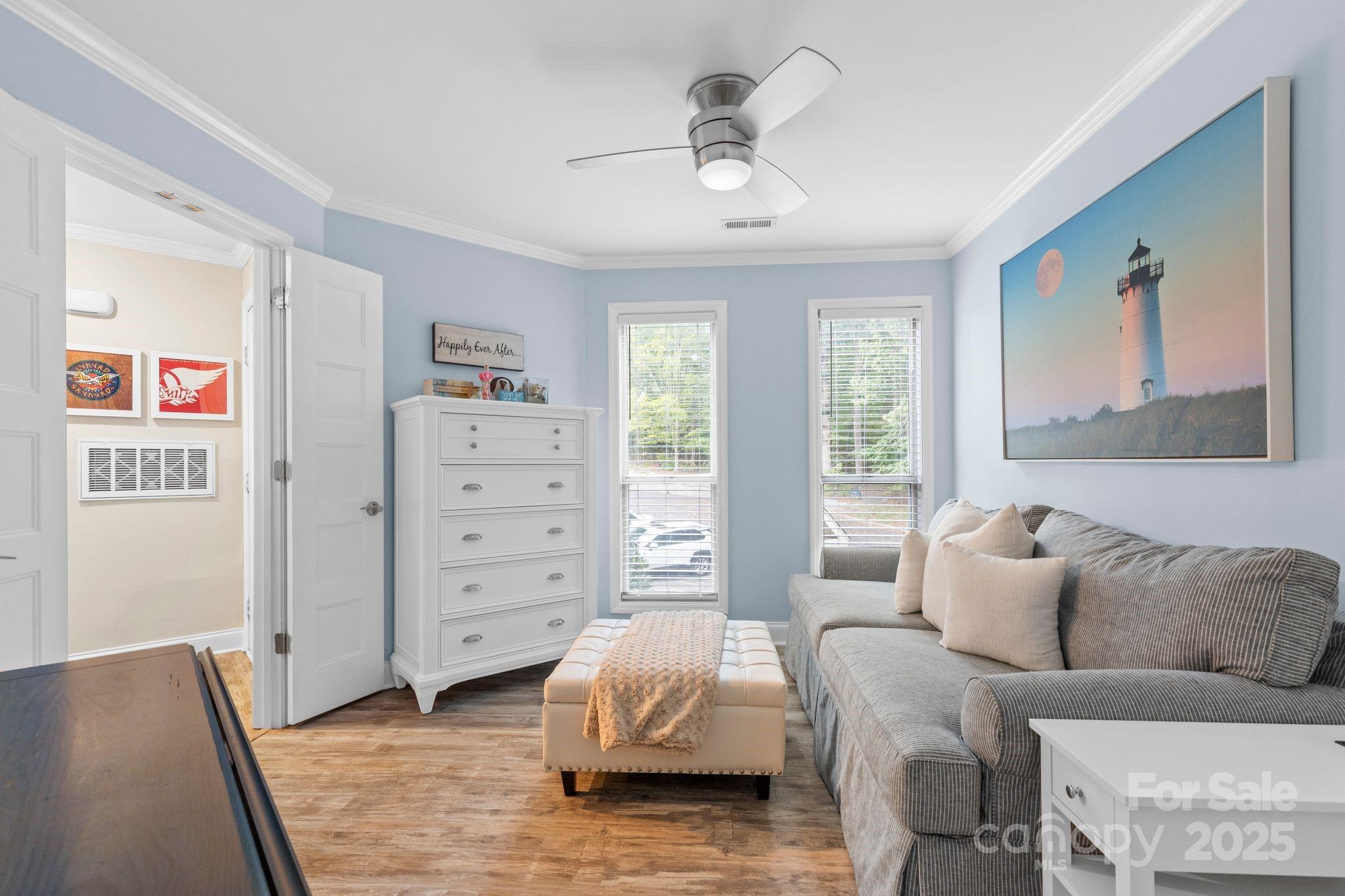 2121 Regatta Lane, Unit 209 Denver, NC 28037 - Photo 20 of 40 a living room with furniture and a window