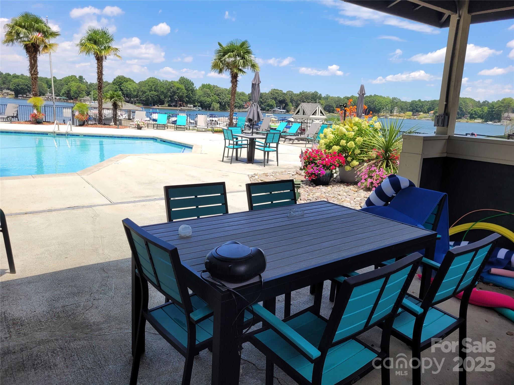 2121 Regatta Lane, Unit 209 Denver, NC 28037 - Photo 24 of 40 a view of an outside dining space with furniture