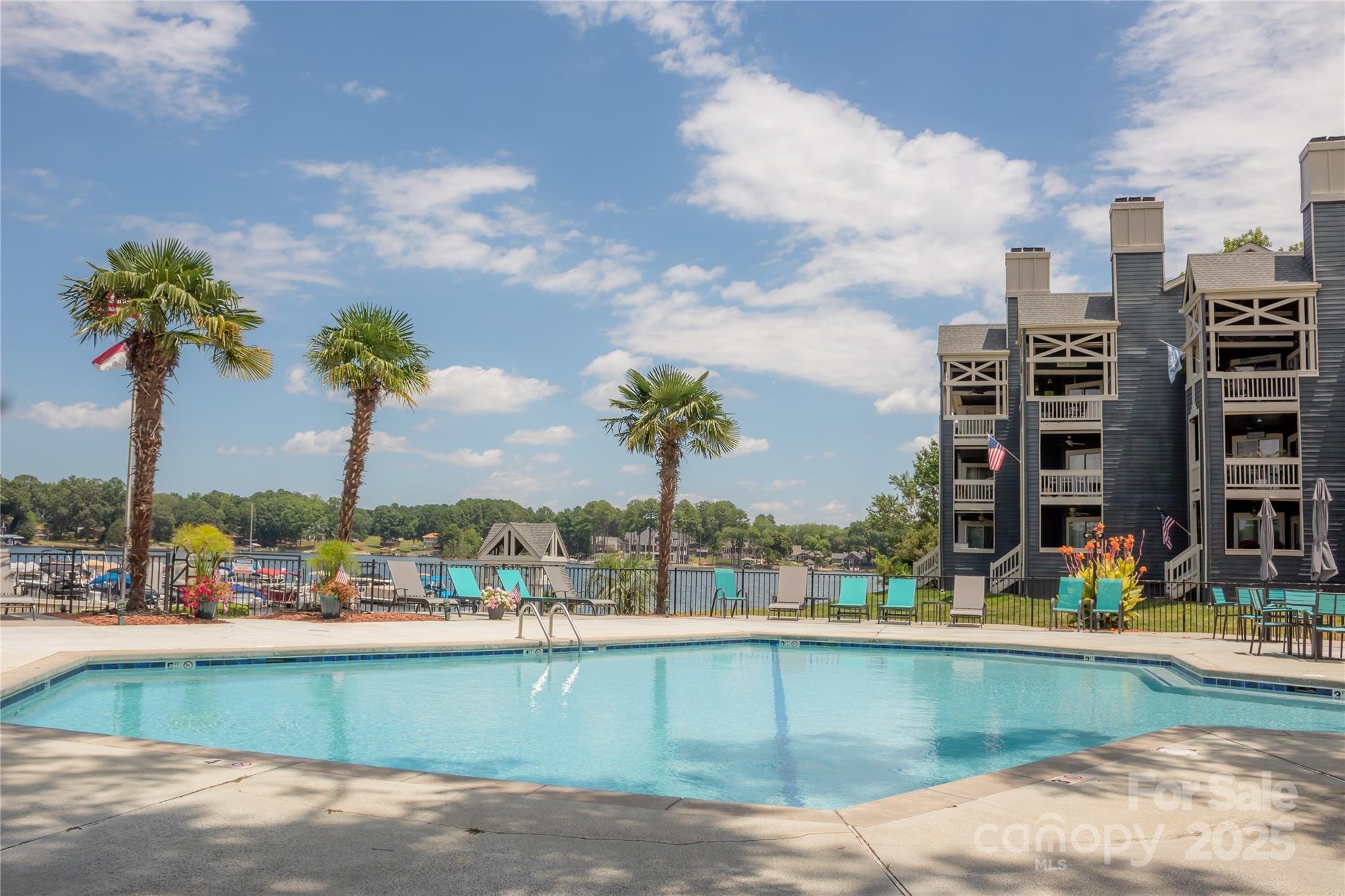 2121 Regatta Lane, Unit 209 Denver, NC 28037 - Photo 26 of 40 a view of a swimming pool with a terrace