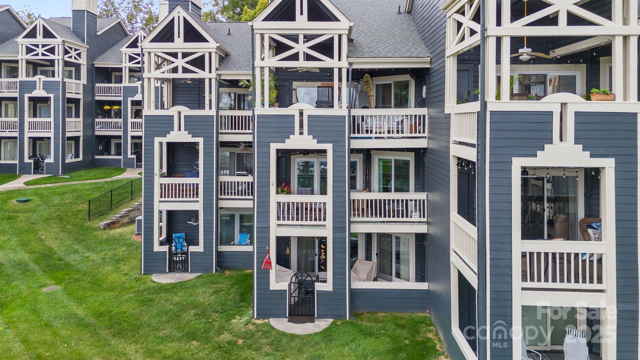 2121 Regatta Lane, Unit 209 Denver, NC 28037 - Photo 33 of 40 a view of front of a big yard