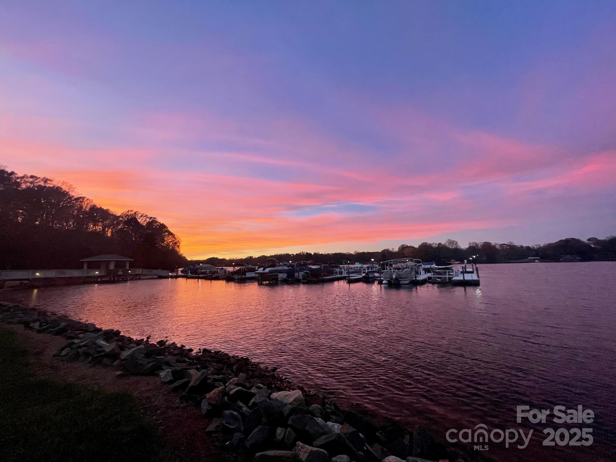 2121 Regatta Lane, Unit 209 Denver, NC 28037 - Photo 38 of 40 a view of lake with sunset