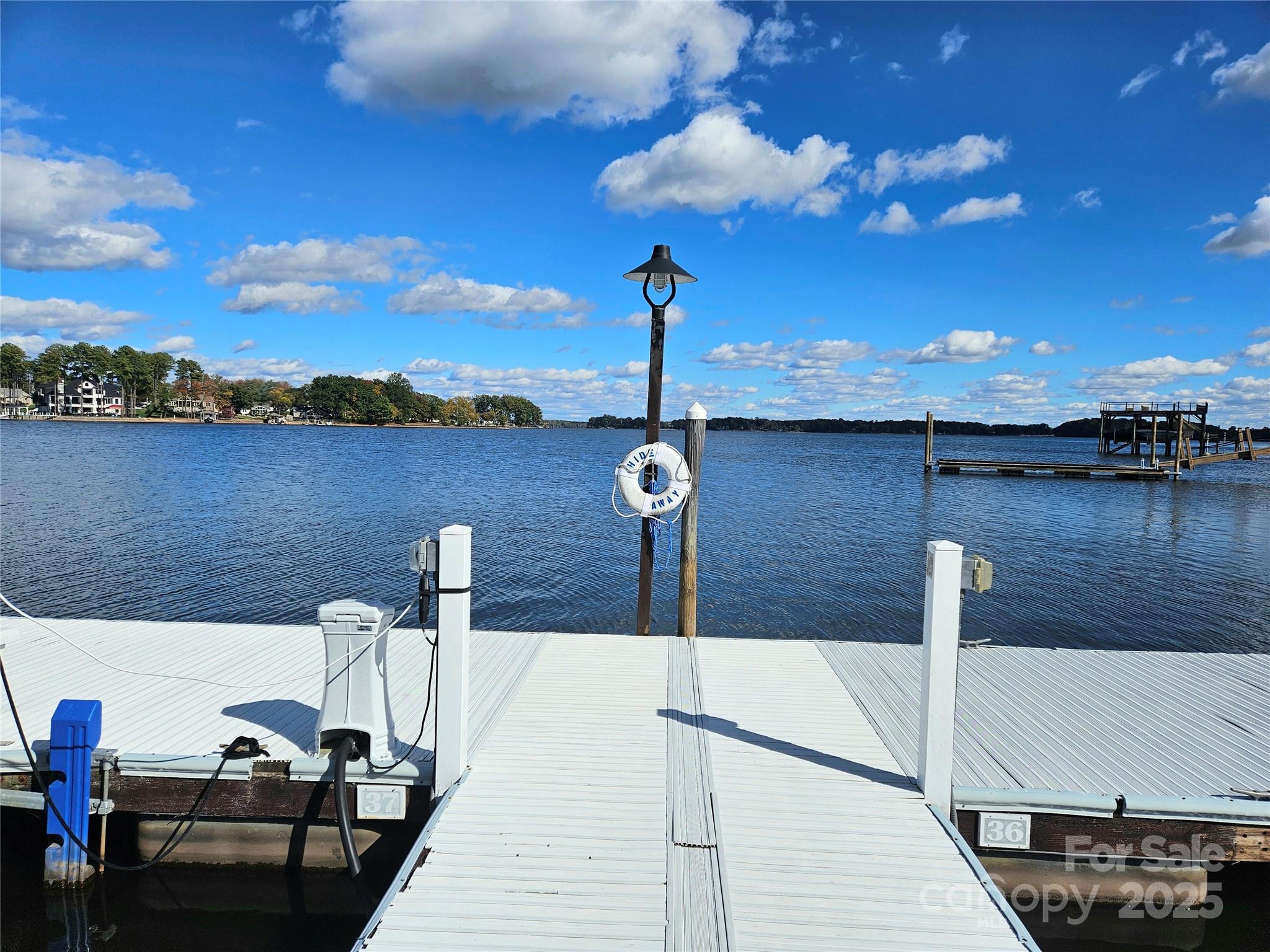2121 Regatta Lane, Unit 209 Denver, NC 28037 - Photo 40 of 40 a view of a terrace with furniture