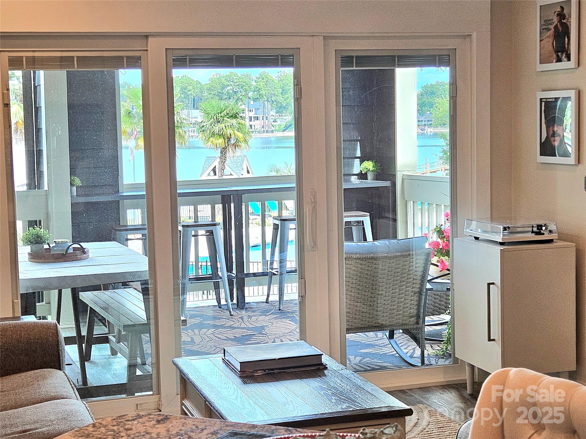 2121 Regatta Lane, Unit 209 Denver, NC 28037 - Photo 8 of 40 a living room with furniture and a window