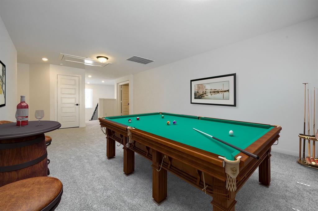 1348 Bay Laurel Road Fate, TX 75087 - Photo 23 of 35 a room with pool table and windows