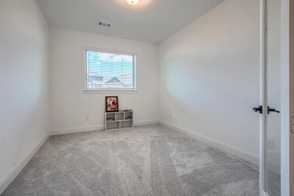 1348 Bay Laurel Road Fate, TX 75087 - Photo 30 of 35 a view of a livingroom with a workspace