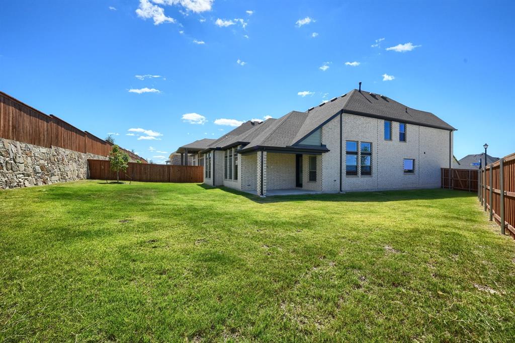1348 Bay Laurel Road Fate, TX 75087 - Photo 4 of 35 a view of a house with a backyard