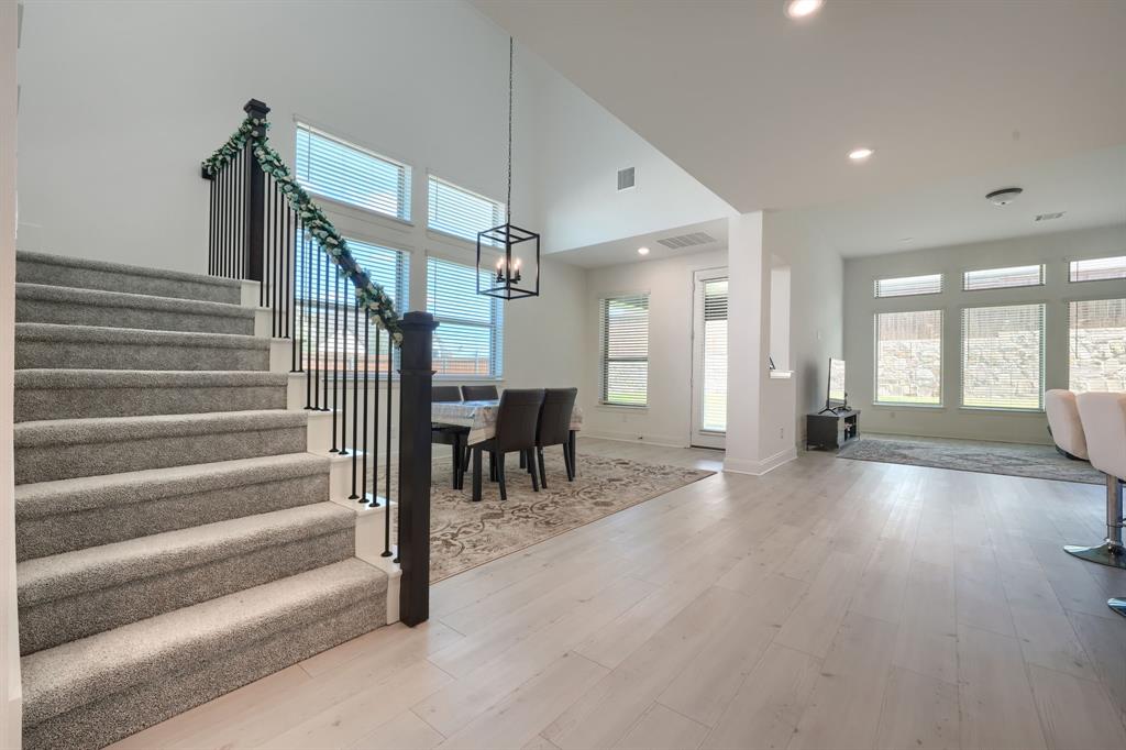 1348 Bay Laurel Road Fate, TX 75087 - Photo 7 of 35 a view of entryway and hall with wooden floor