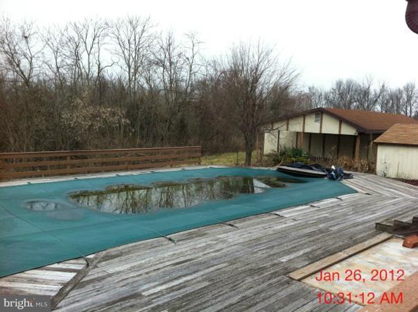 17 Darbys Court Falling Waters, WV 25419 - Photo 3 of 14 a view of a house with a yard