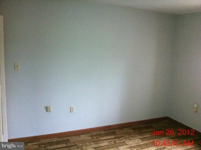 17 Darbys Court Falling Waters, WV 25419 - Photo 5 of 14 a view of a room with wooden floor