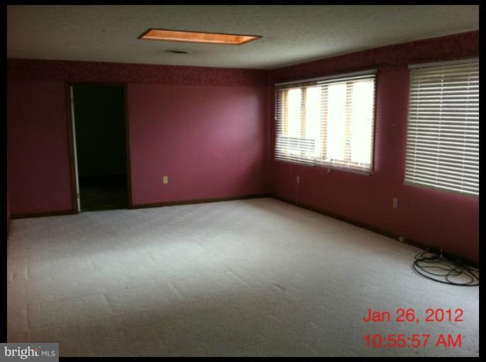 17 Darbys Court Falling Waters, WV 25419 - Photo 10 of 14 a view of an empty room with a window