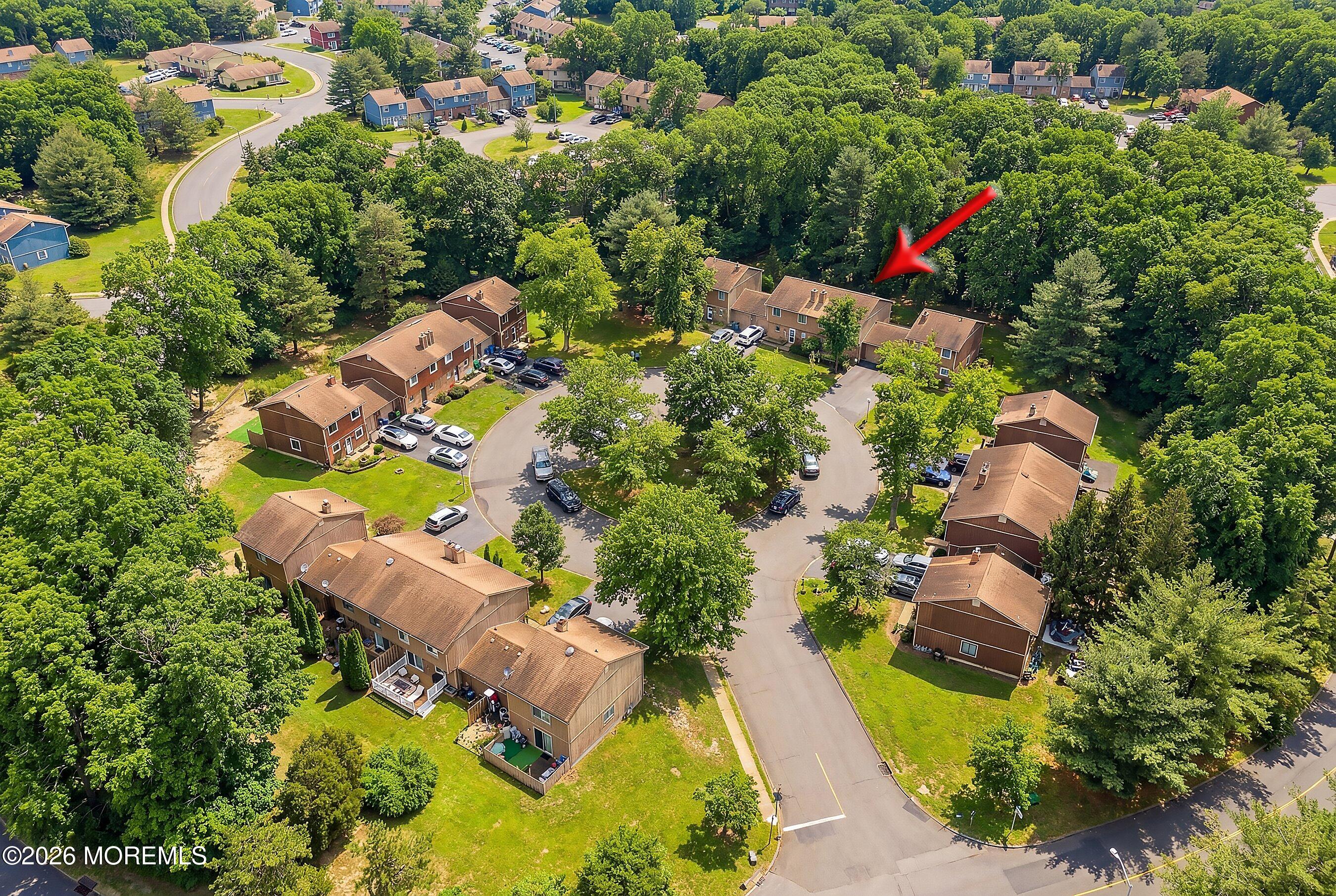 11 Owl Road Howell, NJ 07731 - Photo 11 of 48 an aerial view of a house with a yard and swimming pool