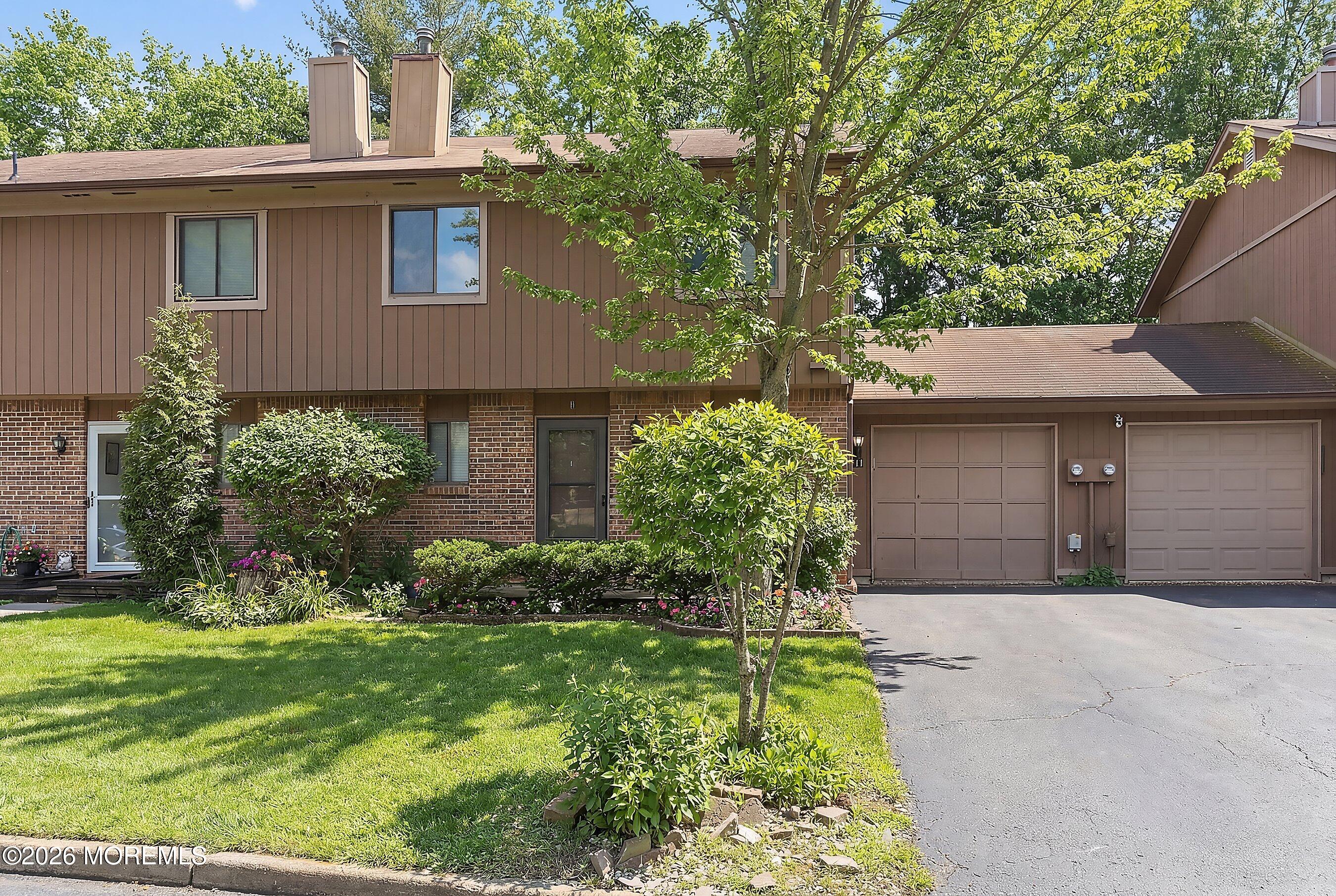 11 Owl Road Howell, NJ 07731 - Photo 2 of 48 front view of a house with a yard