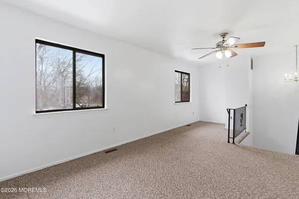 a view of a room with a large window