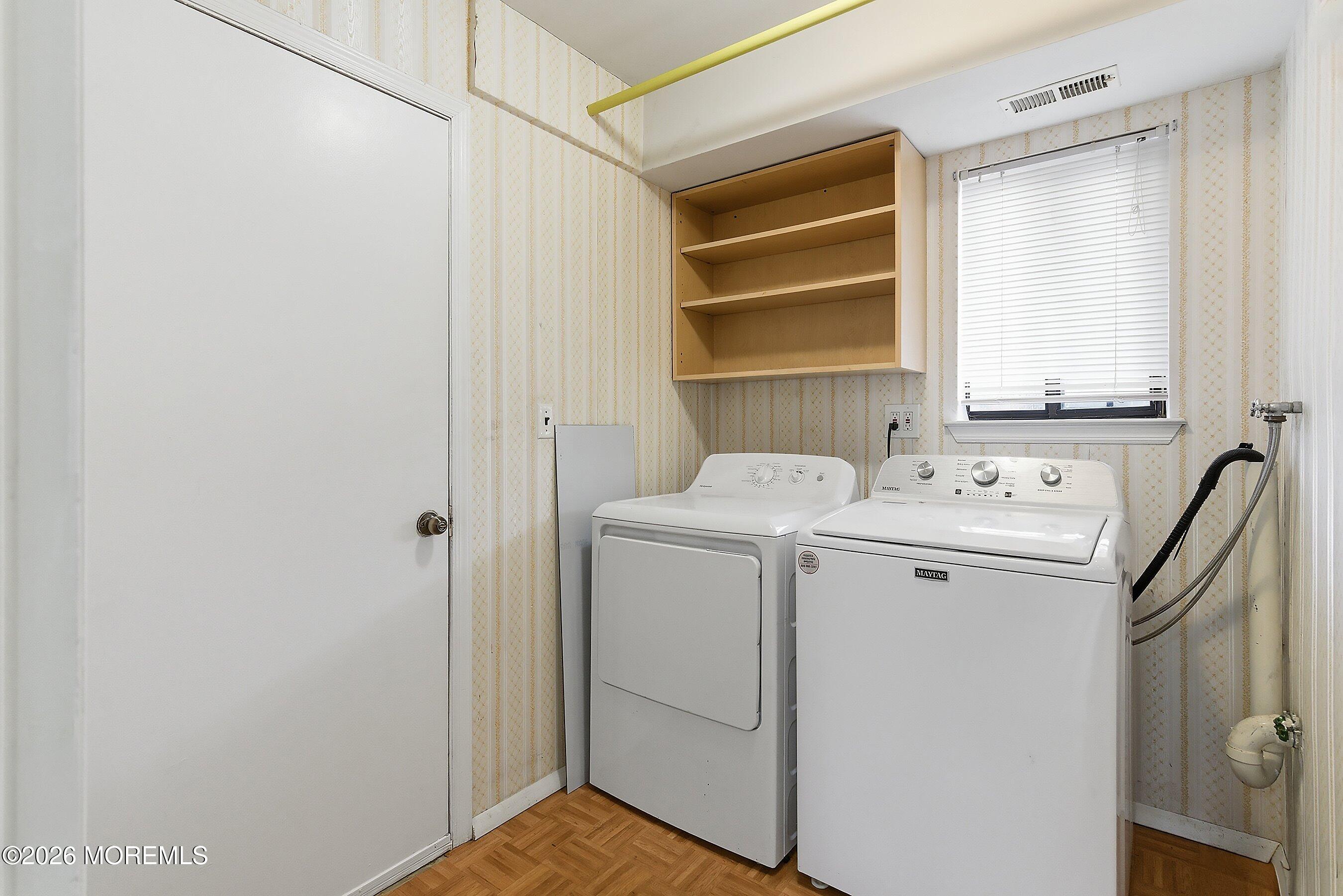 11 Owl Road Howell, NJ 07731 - Photo 25 of 48 a utility room with dryer and washer