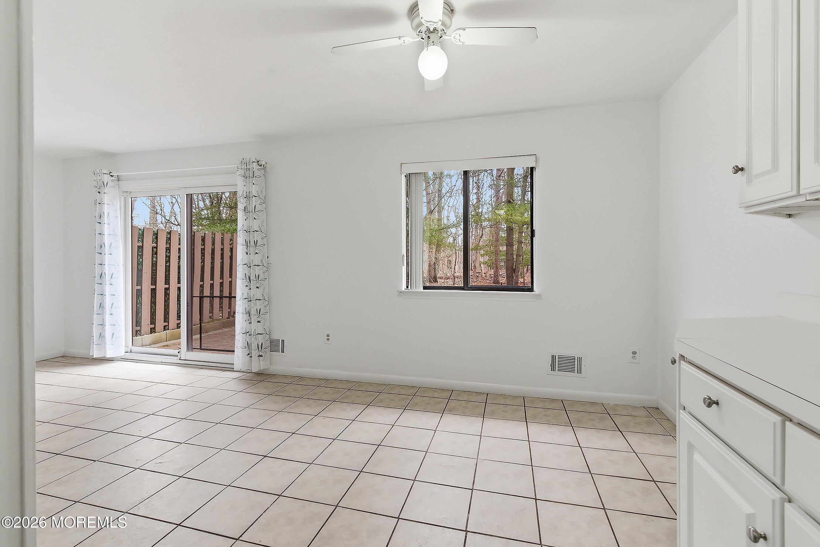 11 Owl Road Howell, NJ 07731 - Photo 26 of 48 a view of an empty room with a window