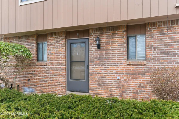 a brick house with a outdoor space
