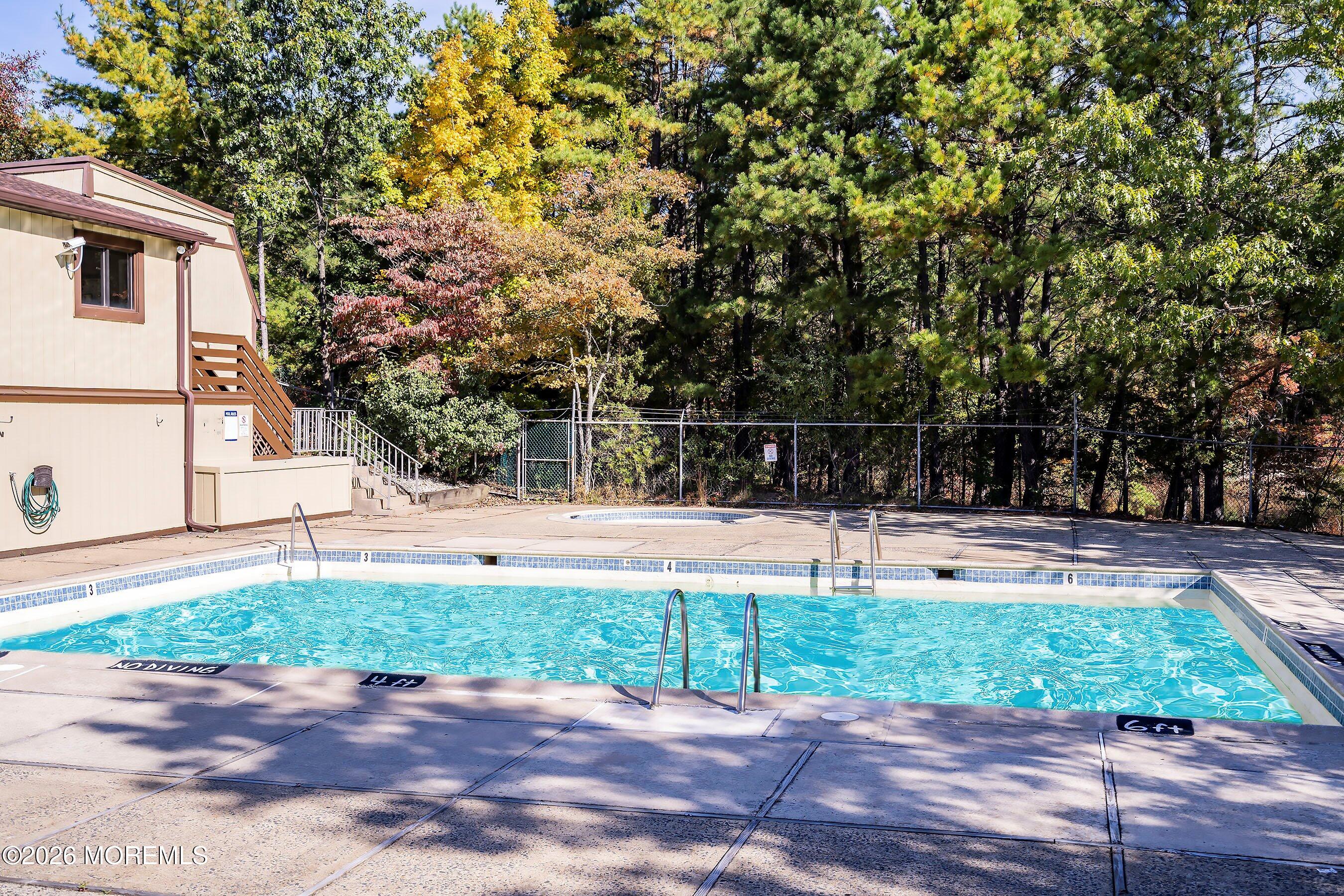 11 Owl Road Howell, NJ 07731 - Photo 41 of 48 a view of a backyard with a garden