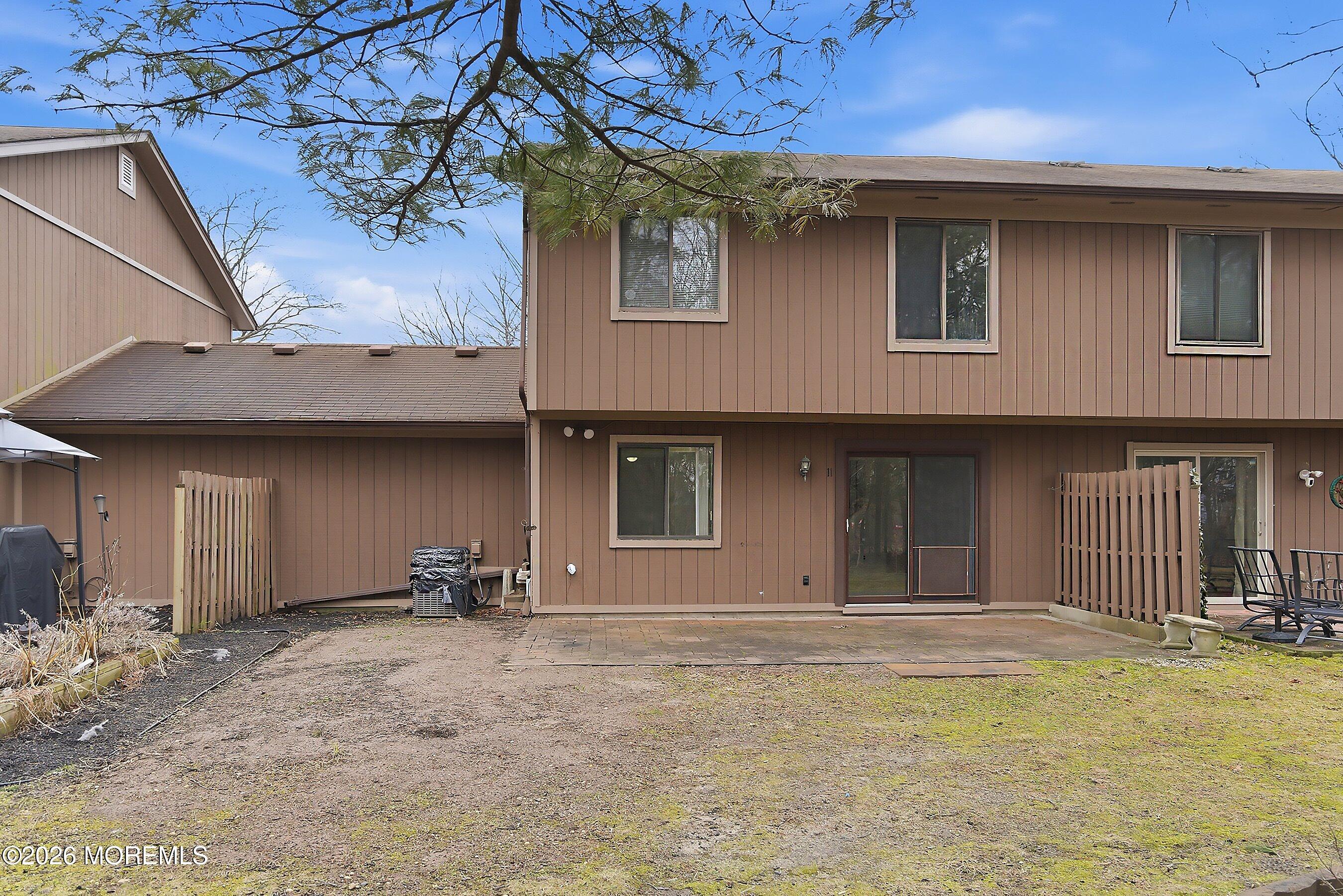 11 Owl Road Howell, NJ 07731 - Photo 45 of 48 a front view of a house with garage