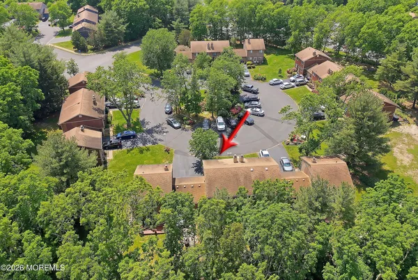 a sign that is sitting on a wooden floor