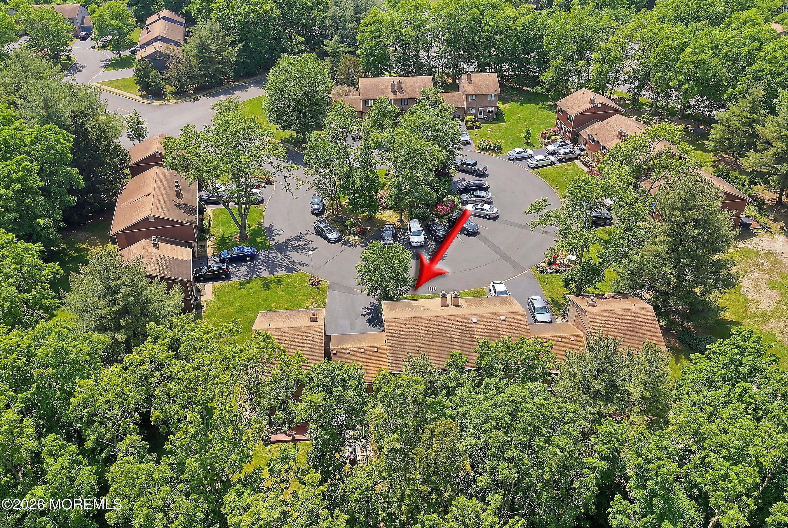 11 Owl Road Howell, NJ 07731 - Photo 47 of 48 an aerial view of a house with a yard and lake view