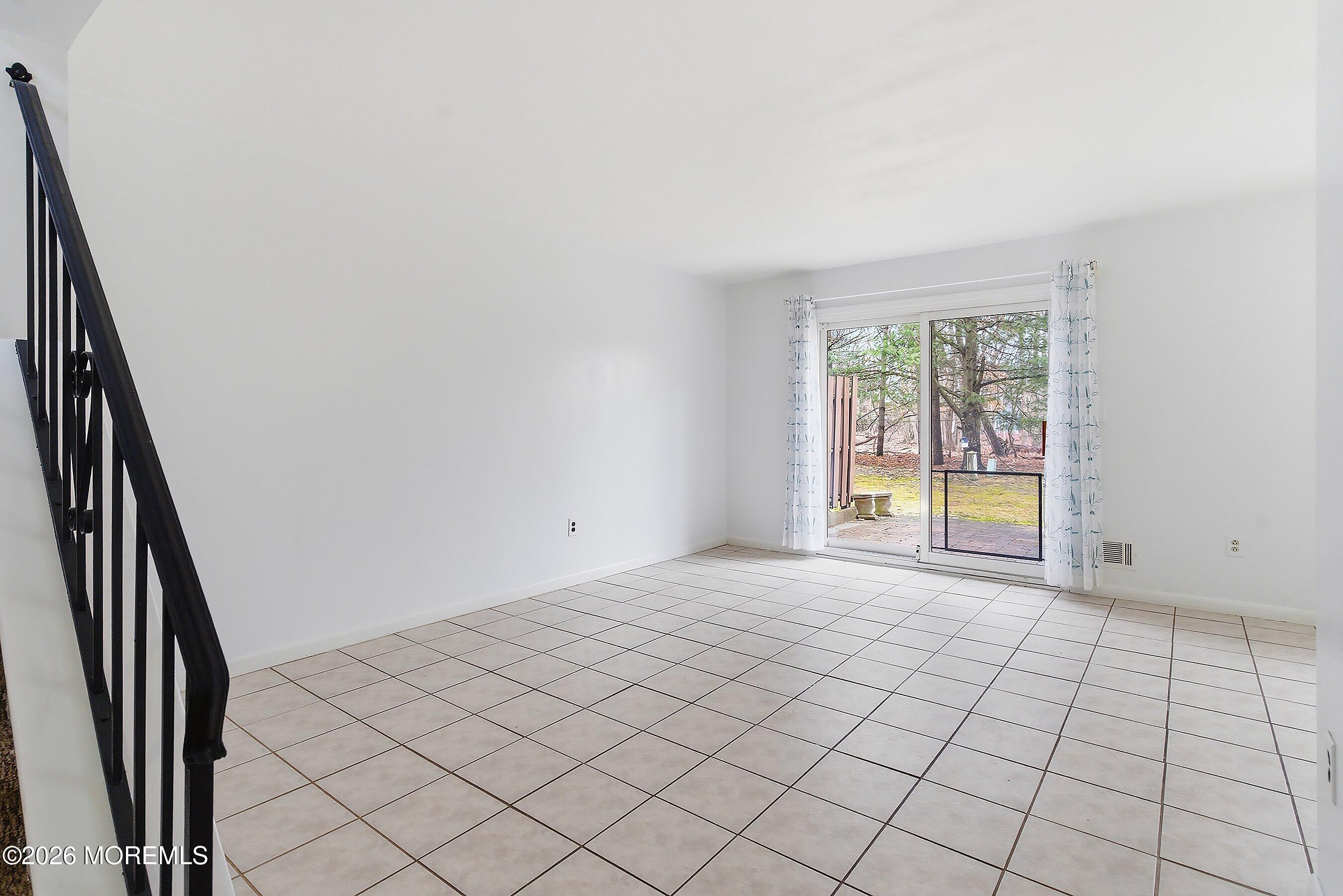 11 Owl Road Howell, NJ 07731 - Photo 5 of 48 an empty room with windows