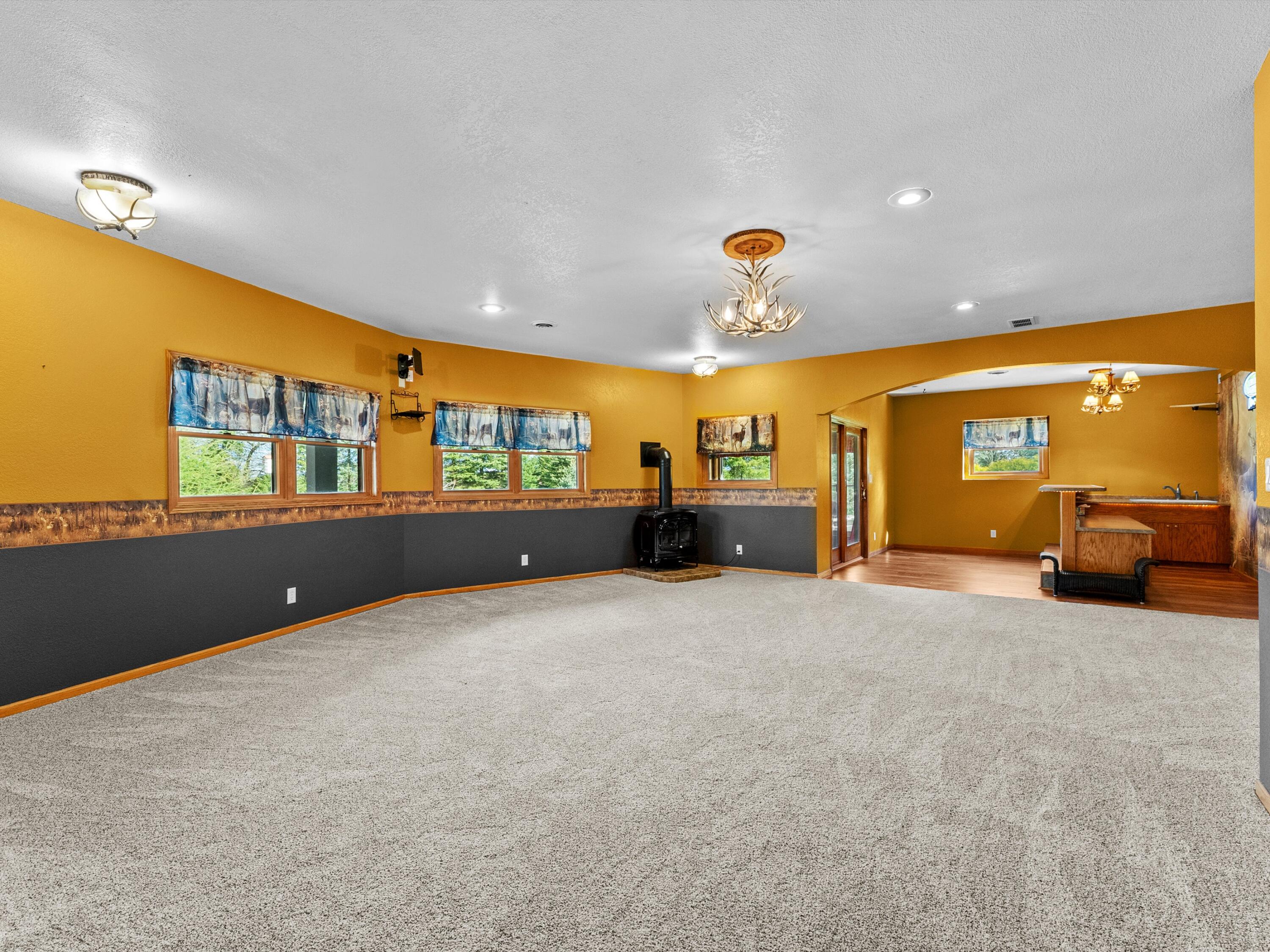4818 Maplecrest Ridge Road Franklin, WI 54247 - Photo 37 of 62 Lower Level Rec Room with Fireplace