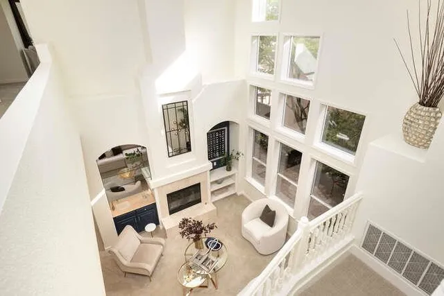 view of living room with furniture and baby crib