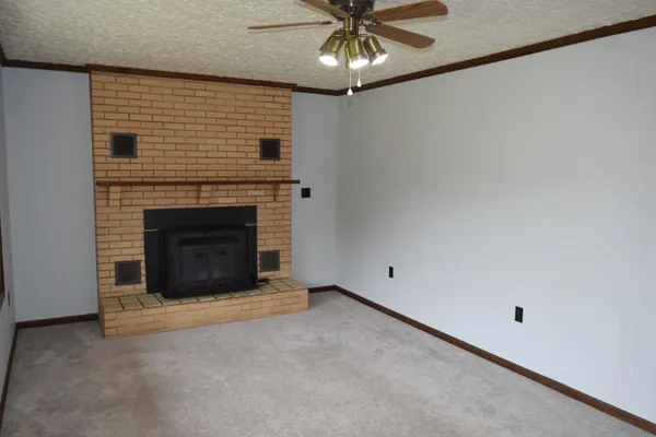 a kitchen with stainless steel appliances a refrigerator and a stove