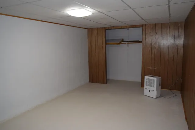 a bathroom with a shower and a toilet