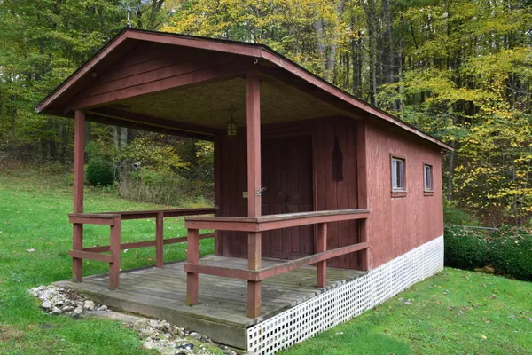 a view of outdoor space with lots of trees