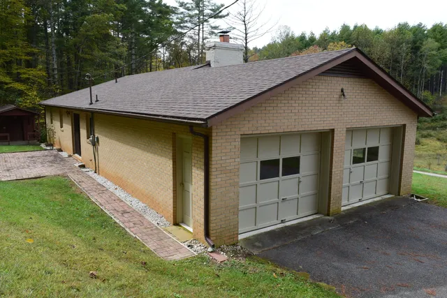 a backyard of a house with lots of green space