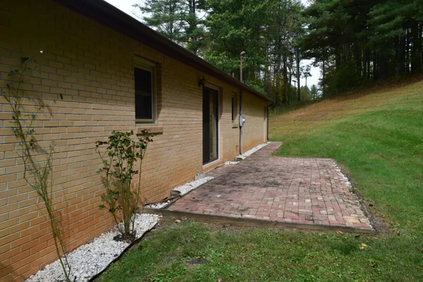 a view of a field with an ocean